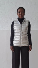 Load and play video in Gallery viewer, Melian Short Vegan Down Vest | Metallic Silver
